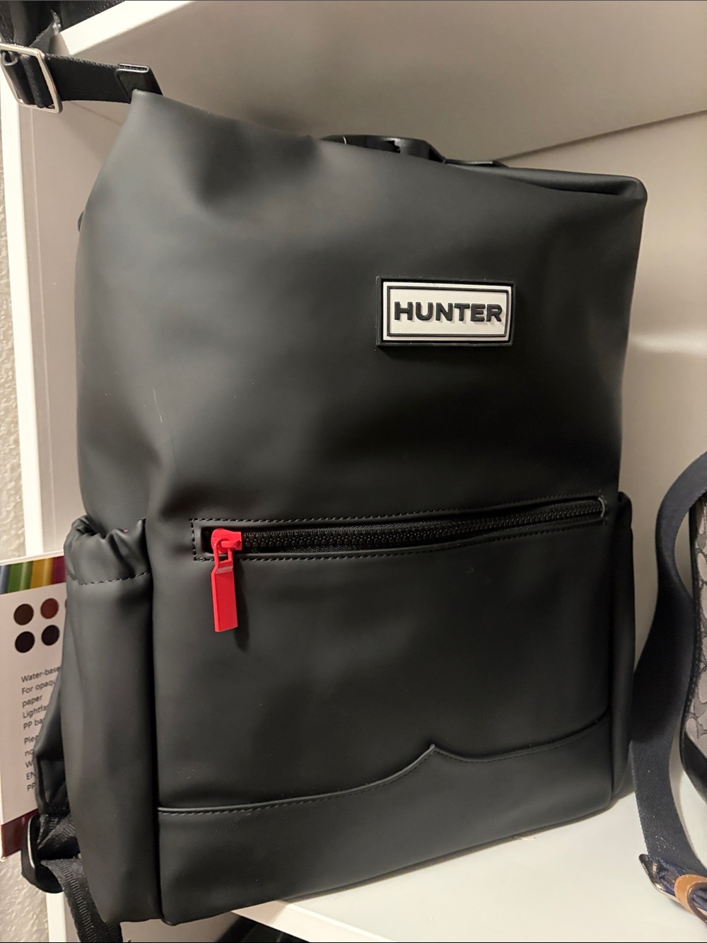 Hunter Black Backpack with Red Zipper Pull